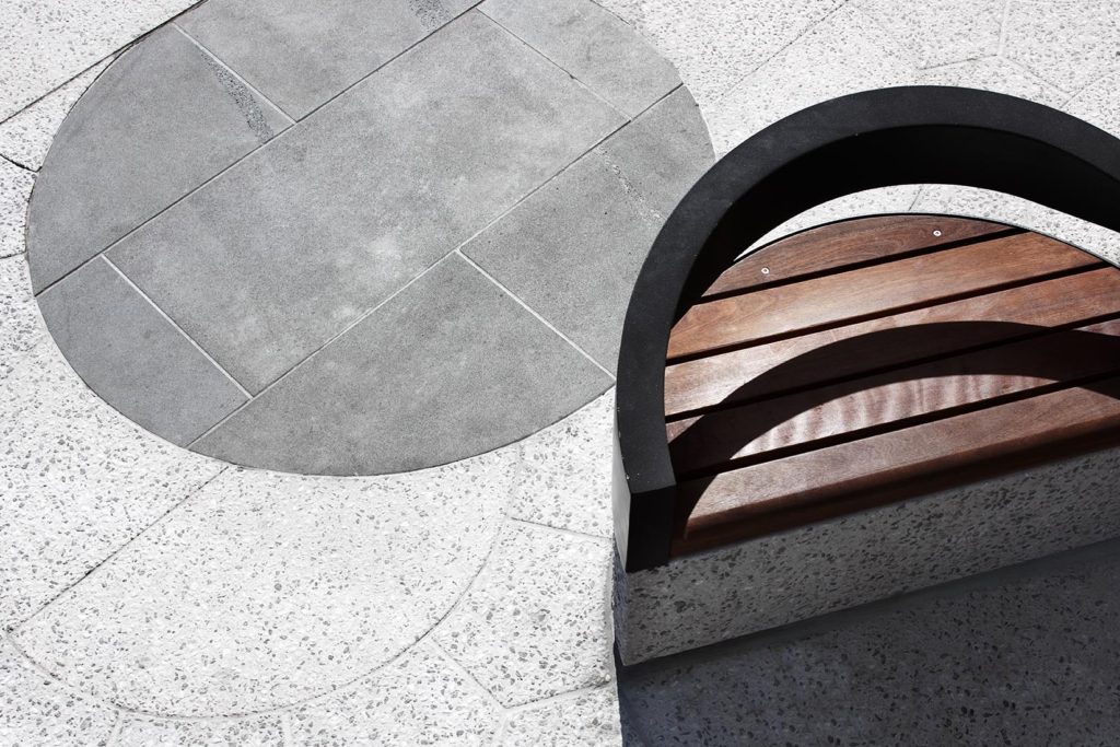 Bluestone and custom exposed aggregate paving at Acland Street, St Kilda.