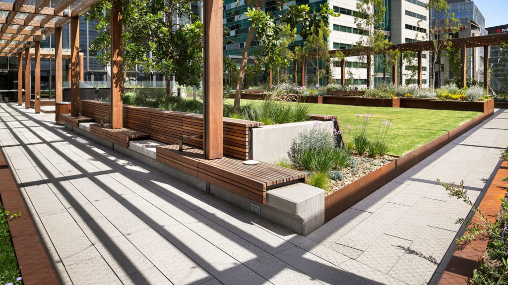 Custom exposed aggregate paving by Anston Architectural at Skypark, Melbourne Quarter.